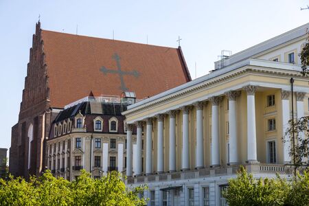 Wroclaw, Poland - July 09, 2018: Church building with a cross on the roof in Wroclaw, Poland.