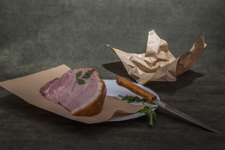 Still life with fresh pork ham on the tableの写真素材