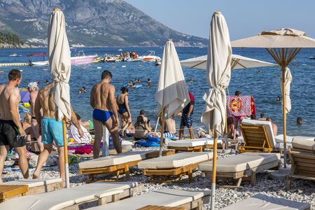 Budva, Montenegro - August 02, 2017: People rest on the beach in the city of Budva, Montenegro