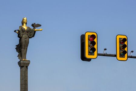 Sofia, Bulgaria - August 09, 2017: Sofia, Bulgaria - August 09, 2017: The statue of Hagia Sophia in the center of Sofia and two traffic lightsのeditorial素材