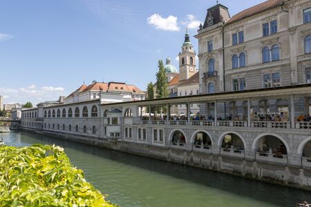 Ljubljana, Slovenia - August 15, 2019: View of the embankment of the Ljubljana River in Ljubljanaのeditorial素材
