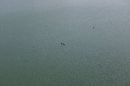 Two pleasure boats with tourists on Lake Bled in Sloveniaの写真素材