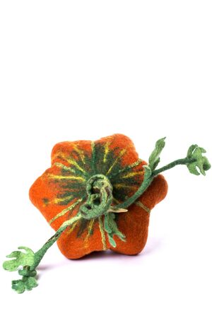 Pumpkin handmade from felted wool for celebration of Halloweenの写真素材