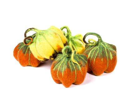 Pumpkins handmade from felted wool for celebration of Halloweenの写真素材