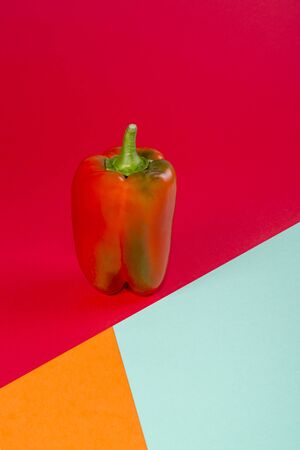 Abstract still life with red sweet pepper on a coloredの写真素材