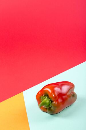 Abstract still life with red sweet pepper on a coloredの写真素材