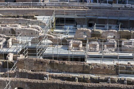 Rome, Italy - August 17, 2019: Building structures for the restoration of the Coliseum
