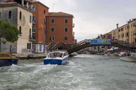 Venice, Italy - August 22, 2019: Architecture and facade of the old city buildings and bridges of Veniceのeditorial素材