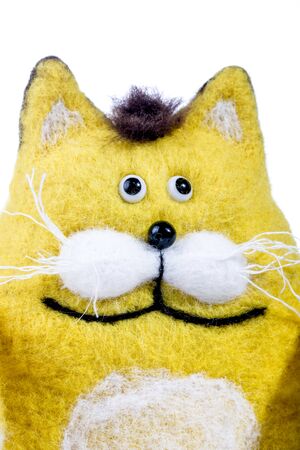 Yellow cat - soft toy made of felted woolの写真素材