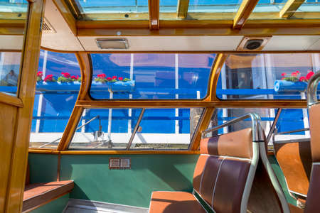 Interior and view of a tourist boat from the inside.のeditorial素材