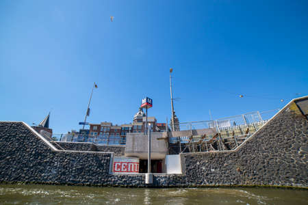 Amsterdam, Netherlands - July 02, 2018: View of the houses on the embankment of Amsterdamのeditorial素材