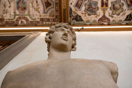 Florence, Italy - August 21, 2019: Ancient Statue at Museum corridor at the Uffizi Gallery in Florenceのeditorial素材
