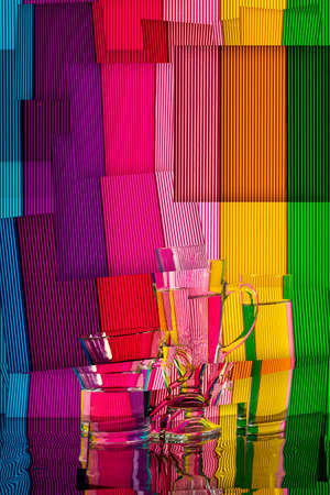 Abstract still life with a glasses of water on a color bright background