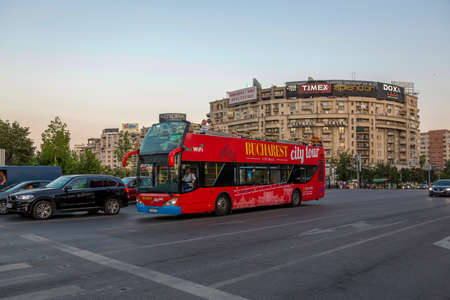 Bucharest, Romania - August 10, 2017: Sightseeing bus on the central streets of Bucharestのeditorial素材