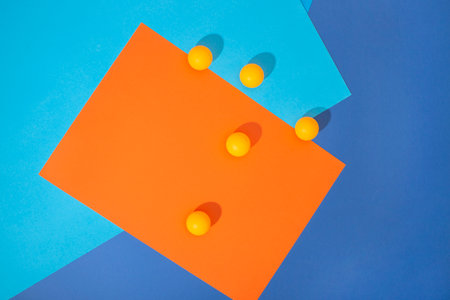 Abstract composition with yellow balls on a colored background