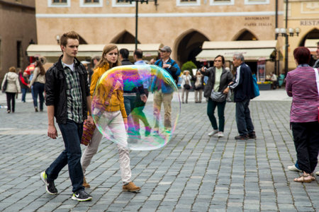 Prague, Czech Republic - June 06, 2013: Big soap bubble on the background of people on the central street of Pragueのeditorial素材