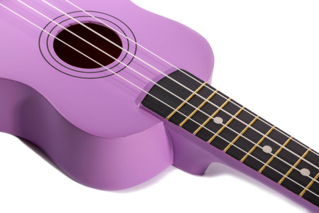 Four string ukulele guitar on white backgroundの写真素材