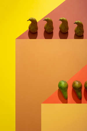 Geometric still life with pears on a colored backgroundの写真素材