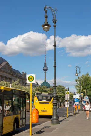 Berlin, Germany - July 01, 2018: Lamp post against the background of a television tower on a street in Berlinのeditorial素材