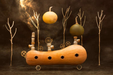 Surreal pumpkin with clockwork parts and pieces of ironの写真素材