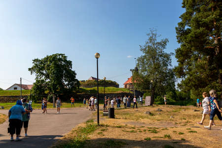 Priozersk, Russia - July 10, 2021: People in front of the walls of the museum-fortress "Korela" in the city of Priozersk in the Leningrad regionのeditorial素材