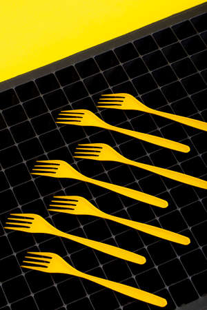 Abstract still life with yellow forks