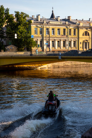 Saint Petersburg, Russia - July 12, 2021: Ride on a jet ski on the Admiralty Canal in Saint Petersburgのeditorial素材
