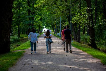 St. Petersburg, Russia - July 13, 2021: People walk along the alley in the Central Park of Culture and Leisure Dubki city of Sestroretsk, St. Petersburgのeditorial素材