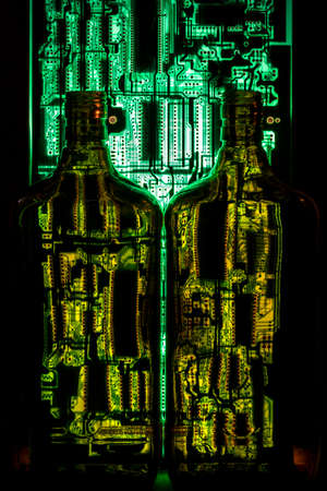 Abstract Still Life with bottles and the background of computer circuit boardsの写真素材