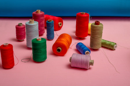 Coils with colored threads on a colored background