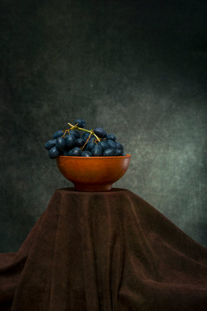 Still life with a bunch of ripe grapes close-upの写真素材