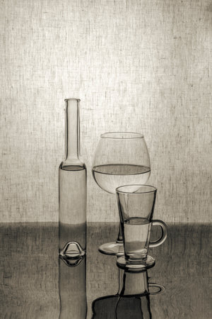 Still life with glassware with a liquid that does not reflect the surfaceの写真素材