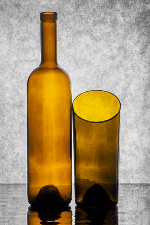 bottle and part of the bottle on a gray backgroundの写真素材