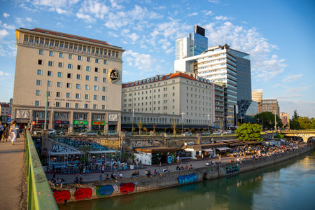 Vienna, Austria - June 13, 2023: Multi-storey on the Danube Canal embankment in Vienna