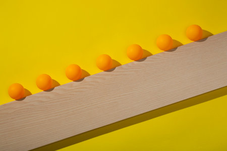 Abstract still life with balls on a wooden board