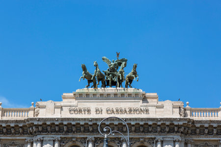 Rome, Italy - August 16, 2019: Bronze chariot on the facade of the Palace of Justice in Rome