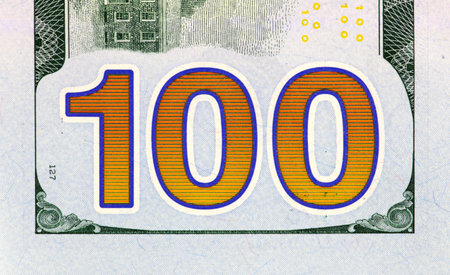 Inscription 100 on the reverse side of the banknote 100 dollars