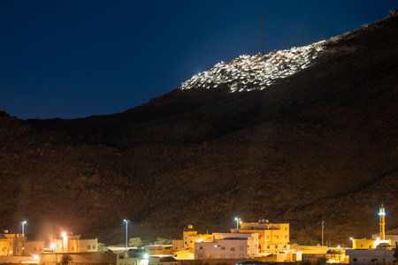 Abha Nightscape with Glowing Mountain Lightsの写真素材