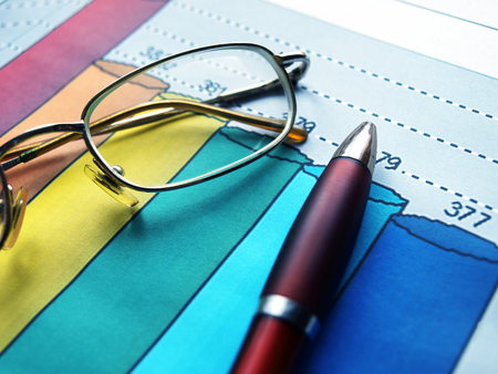 Money laying on the table of an exchange rate of currency.の写真素材