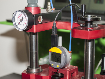 View on green working place with equipment and tools for car trucks components parts details diagnostic calibration maintenance repair works. Car diagnostic station. Car maintenance MOT equipmentの写真素材