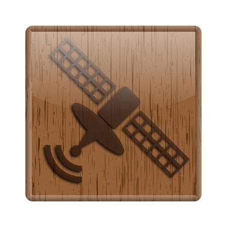 Shiny icon with brown design on wooden backgroundの写真素材