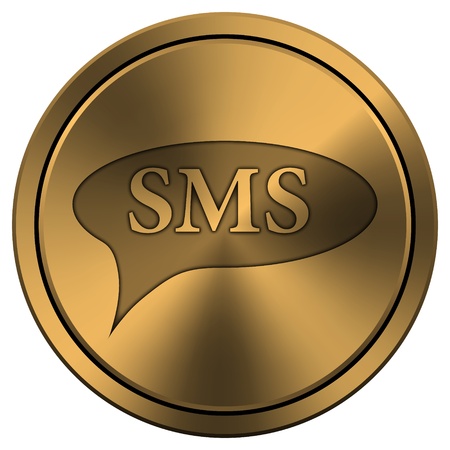 Metallic icon with carved design on copper-colored backgroundの写真素材