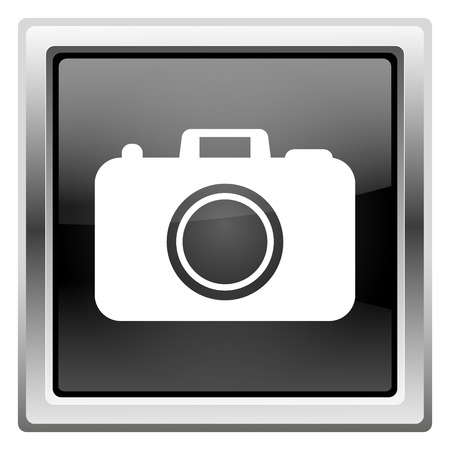 Metallic icon with white design on black backgroundの写真素材