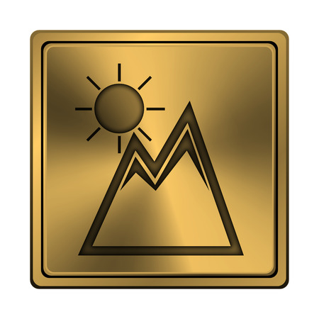 Square metallic icon with carved design on copper backgroundの写真素材