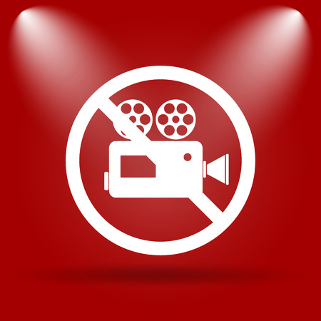Forbidden video camera icon. Flat icon on red background.の写真素材