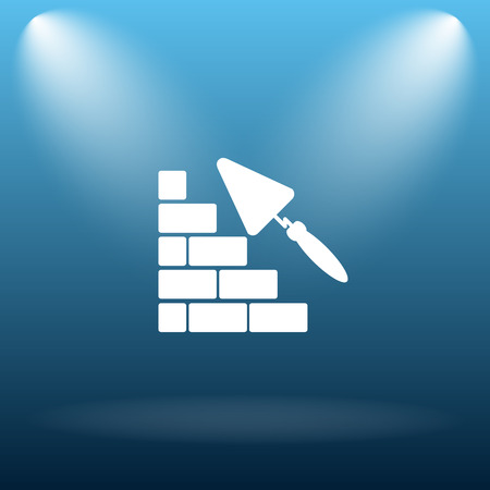 Building wall icon. Internet button on blue background.の写真素材