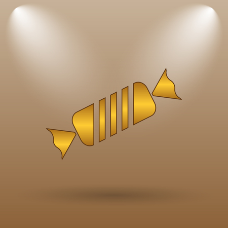 Candy icon. Internet button on brown background.の写真素材