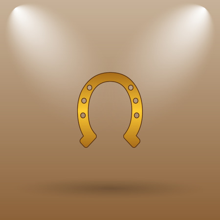 Horseshoe icon. Internet button on brown background.の写真素材