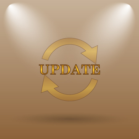 Update icon. Internet button on brown background.の写真素材