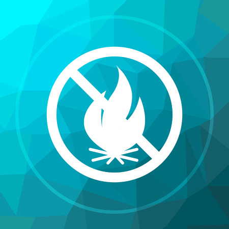 Fire forbidden icon. Fire forbidden website button on blue low poly background.の写真素材